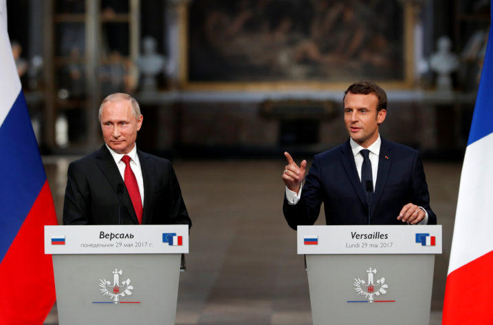 France’s Macron, alongside Putin, denounces Russian media for election meddling